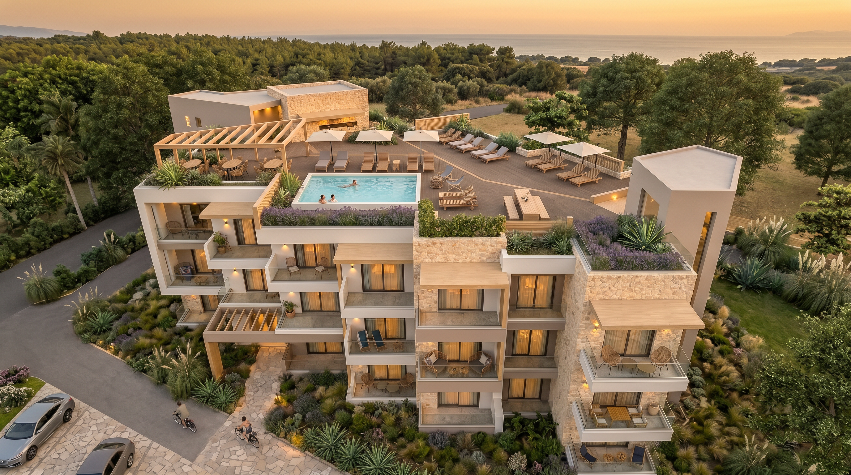 Top-floor outdoor pool area with loungers, stone finishes, and sea view